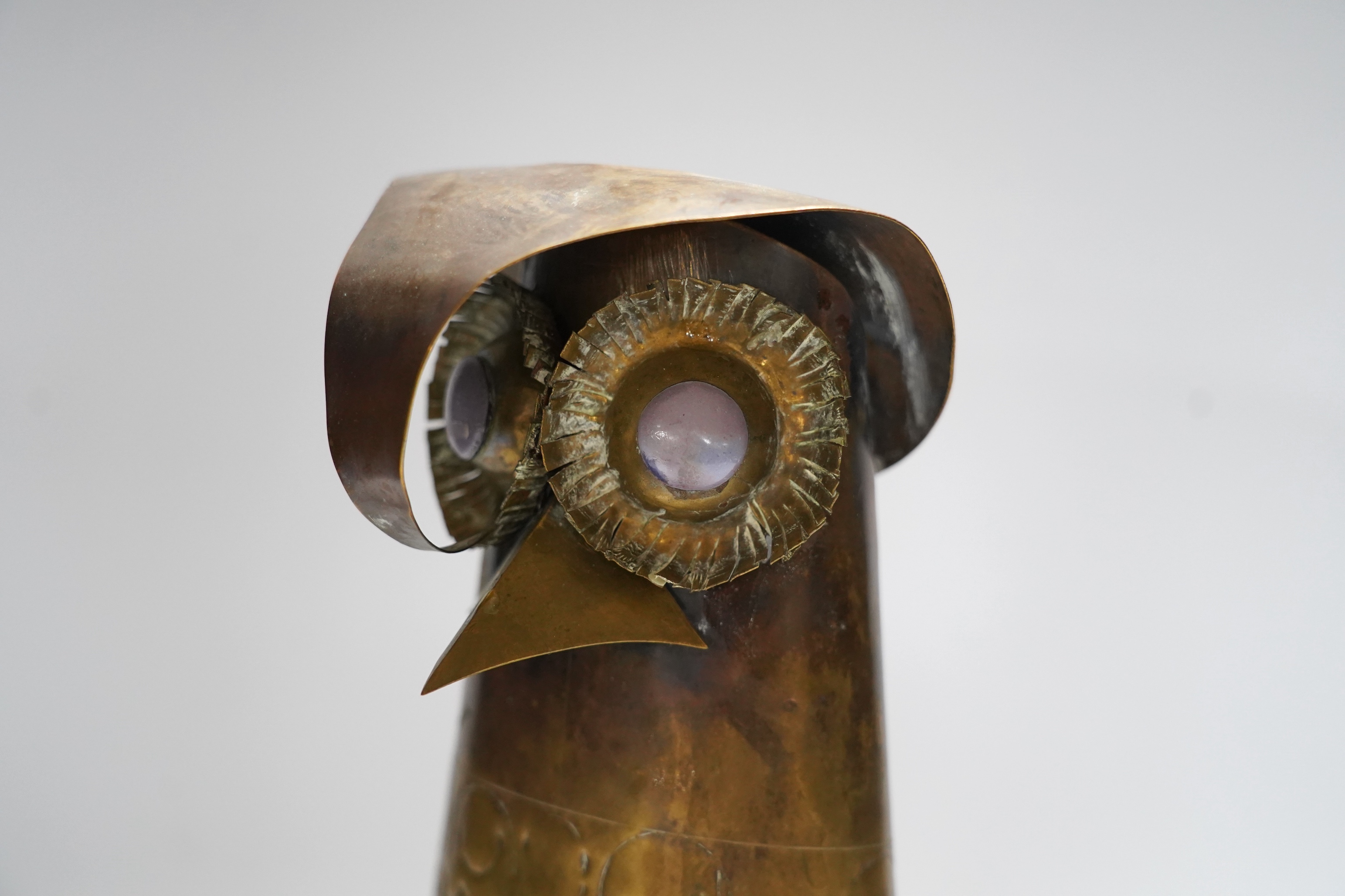 Oswaldo Guayasamin (Ecuadorian, 1919-1999), brass sculpture of an owl with cabochon set eyes, signed verso, 31cm high